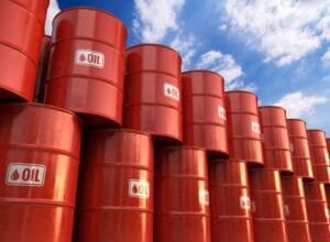 Crude oil barrels with a strategic reserve concept background.