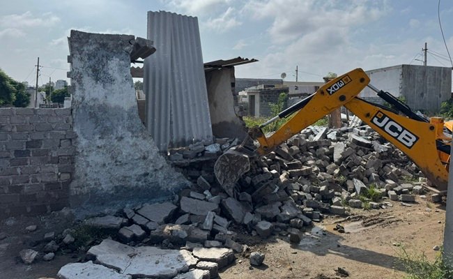 HYDRAA Demolishes Illegal Constructions on 100 Acres in Gajularamaram
