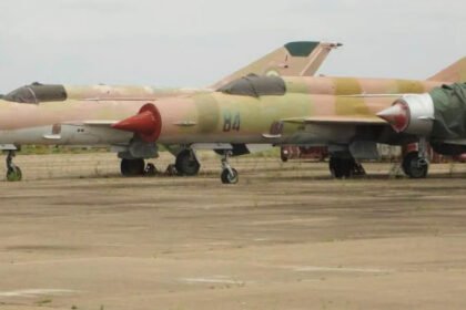 MiG-21 jets in formation during a flypast