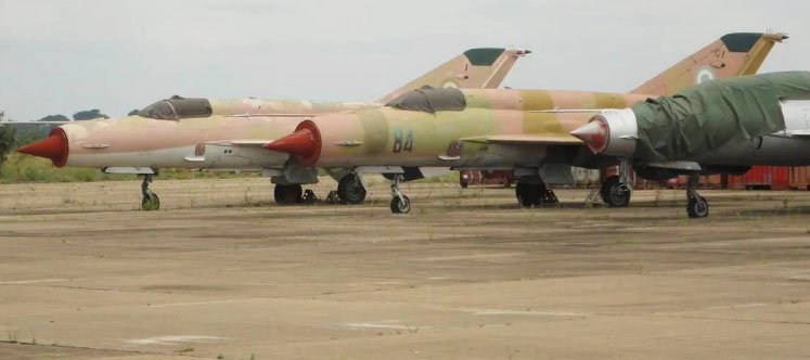 MiG-21 jets in formation during a flypast