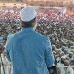 A wide shot of Asaduddin Owaisi addressing a rally in Bihar