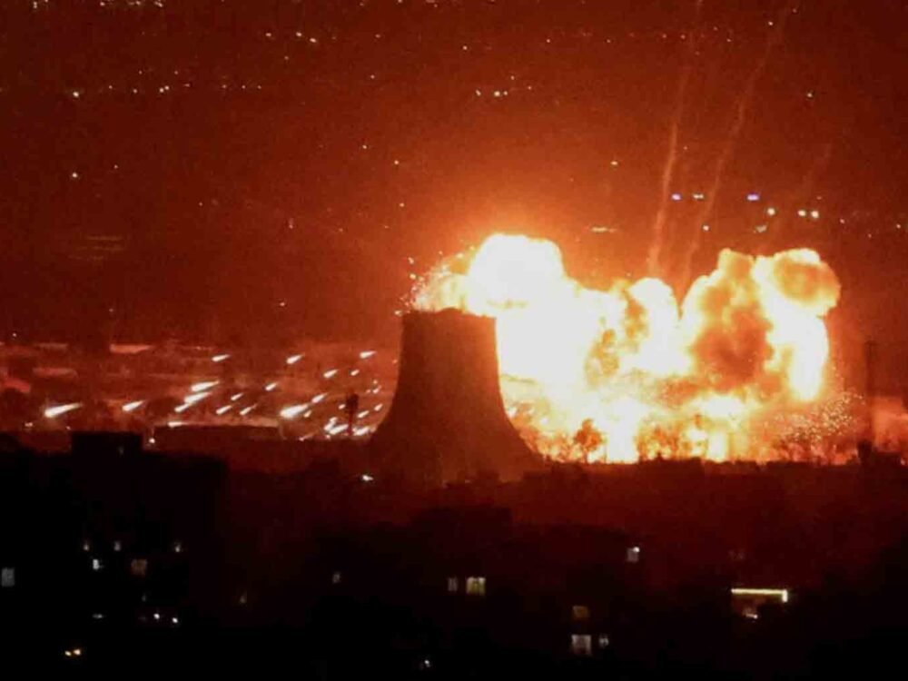 WHO Warns of Health Risks From “Black Rain” After Strikes on Iran Oil Facilities