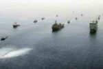 US-Iran Conflict Escalates with Strikes Across Strait of Hormuz