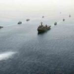 US-Iran Conflict Escalates with Strikes Across Strait of Hormuz
