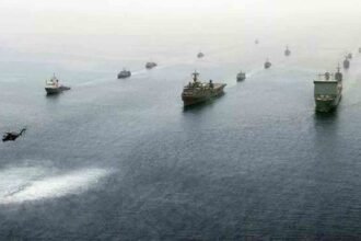 US-Iran Conflict Escalates with Strikes Across Strait of Hormuz