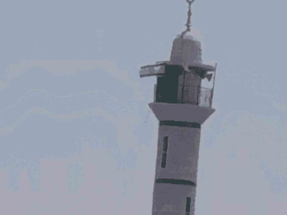 Israeli flag on the minaret of Abu Ubaida Mosque