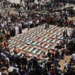Mass Funeral in Gaza as 112 Victims